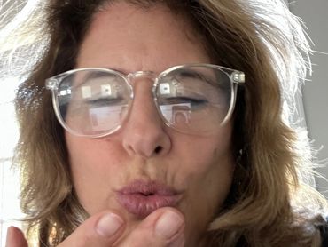 A woman with glasses