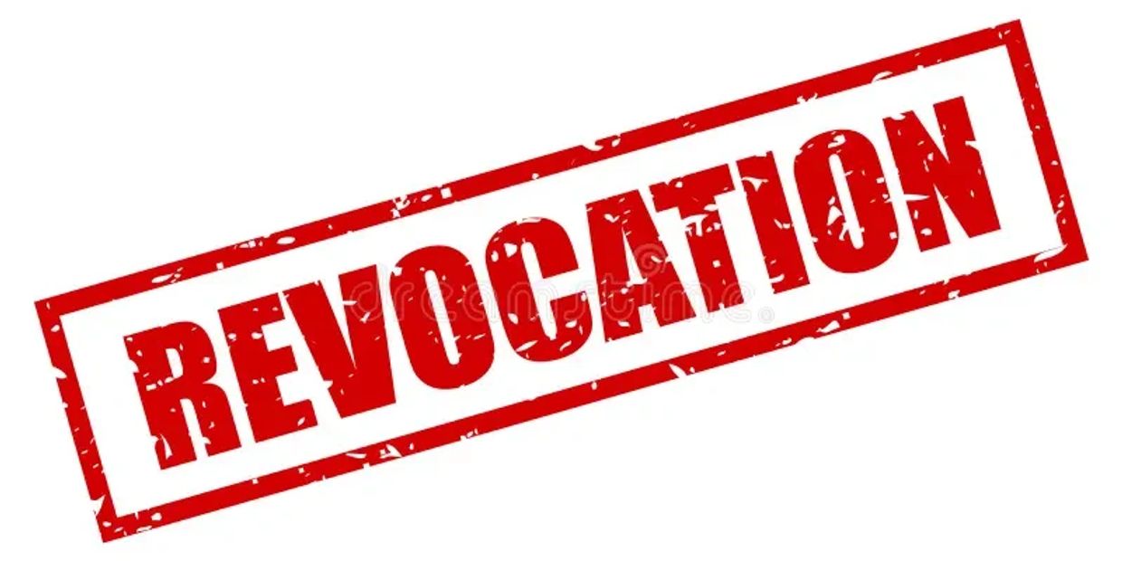 Red stamp with the word REVOCATION.