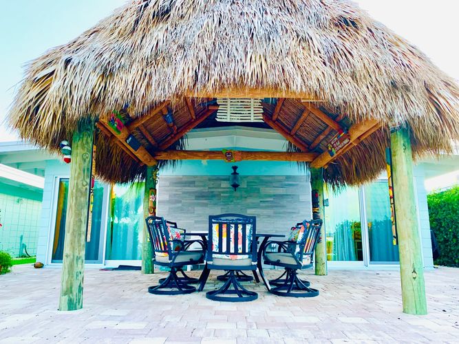 Waterside view of Manatee Bungalow with new tiki hut