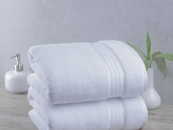 Stack of folded white hand towels