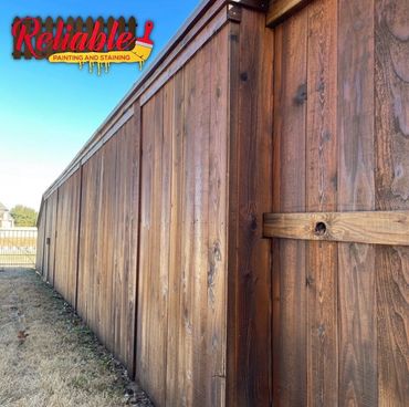 Cedar privacy fence staining in Trophy Club Texas by Reliable Painting and Staining.