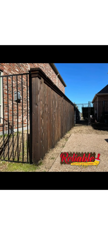 Freshly stained wood fence in Trophy Club Texas by Reliable Painting and Staining