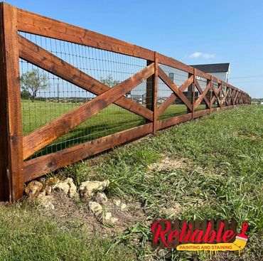Post and rail ranch fence staining in Northlake Texas by Reliable Painting and Staining.