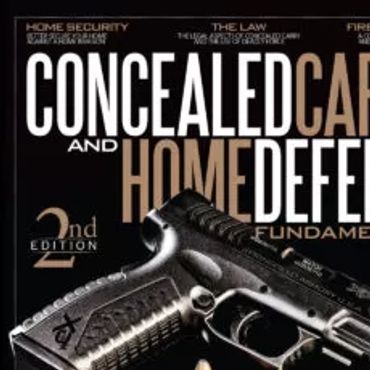 Semi Automatic Handgun and Cartridges on a table