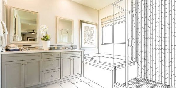 Blueprints depicting bathroom remodeling and half finished work.