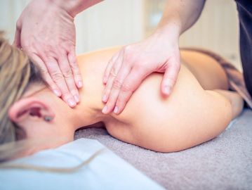 A woman having a luxury facial and Indian Head Massage.