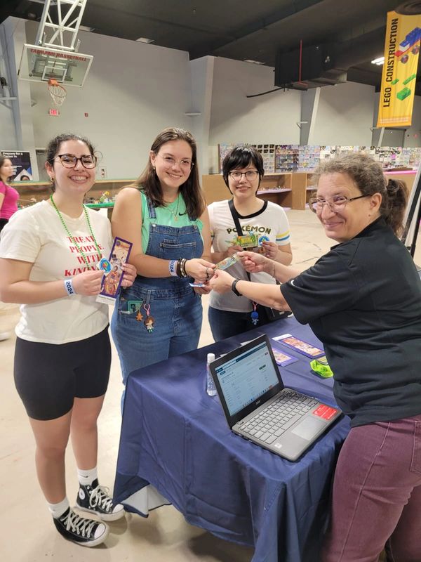 Three women smiling.