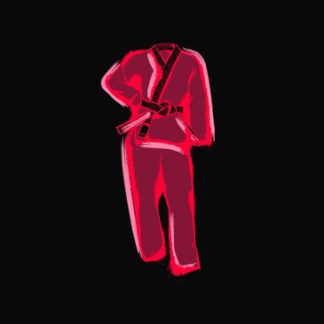 Red martial arts gi on black background.