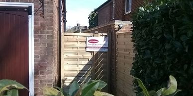 Hit and miss wooden gate