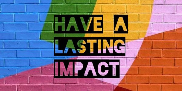  A multicolored brick background with the phrase, "Have a lasting impact," on it.