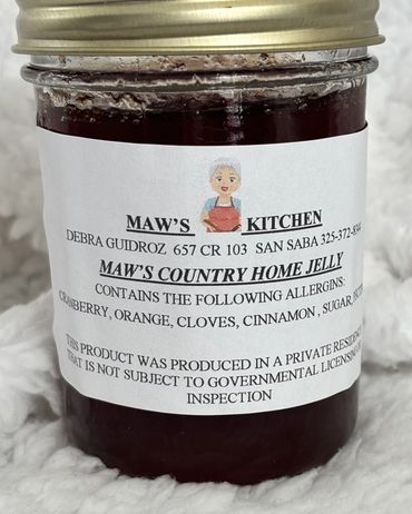 Jar of Maw's Country Home Jelly with a homemade label.