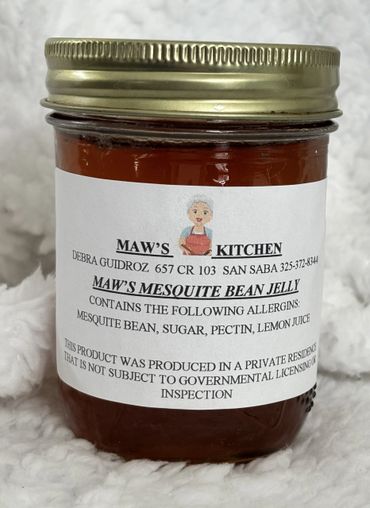 Jar of Maw's Mesquite Bean Jelly with homemade label and ingredients.