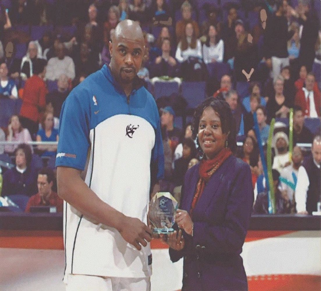 A woman giving award