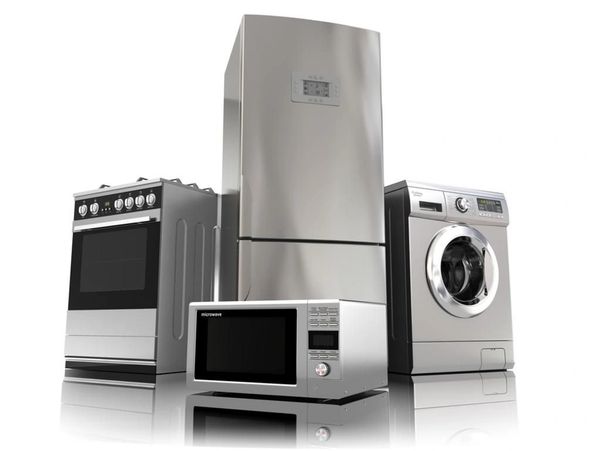 A modern collection of stainless steel appliances: a refrigerator, oven, microwave