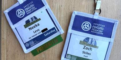 Two American Holistic Nurses Association badges for Neeka and Zach.