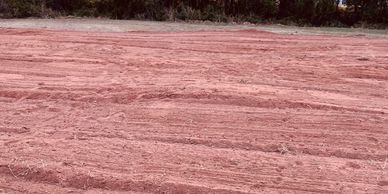 Ten mounds of dirt laid out for future shade structure on the WAMS RC Club 40 acres