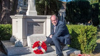 Councillor Tim Barrott laying a wreath, featured in the virtual service.