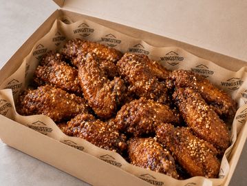 Box of crispy garlic chicken wings.