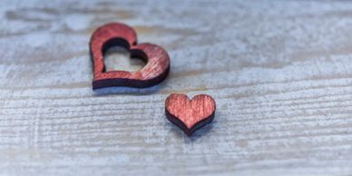 Two wooden heart shapes.