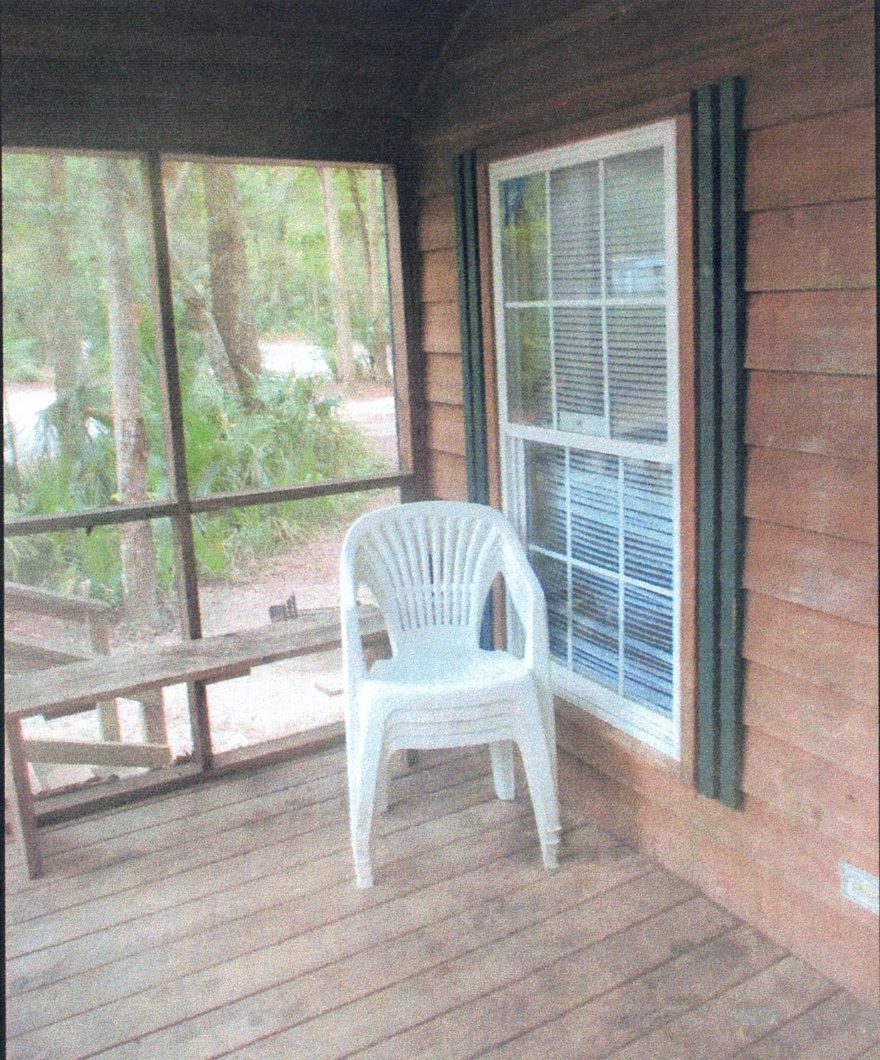 Front porch of a cozy cabin rental at Hanna Park