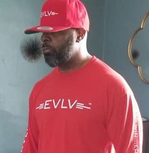 A man showing his outfit