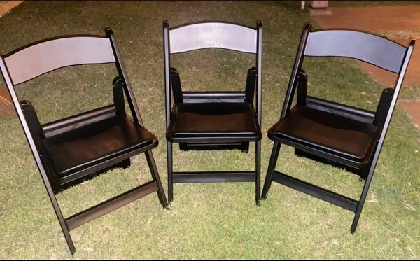 cushioned black chairs