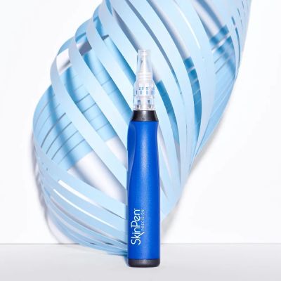 Blue SkinPen Precision device with decorative background.