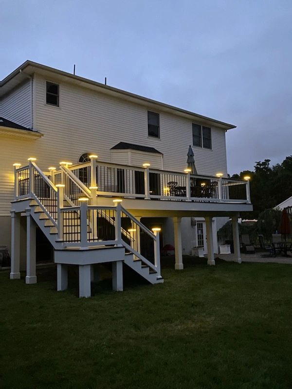 Night pic of second story full PVC deck
