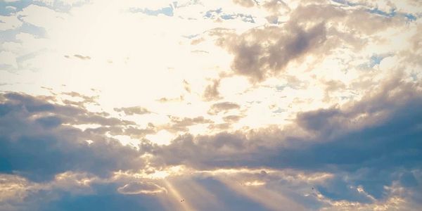 Sun rays breaking through clouds.