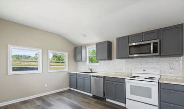 This is a representation of the unit. Not the exact one. Spacious Kitchen, both units.