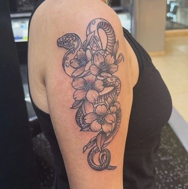 snake and flowers tattoo