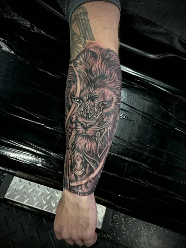 black and white lion and spartan forearm tattoo walkin tattoos and piercings near me ft myers