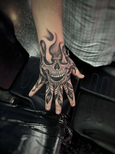 skull vines smoke hand tattoos tattoo shop tattoo parlor piercings piercings near me florida artist