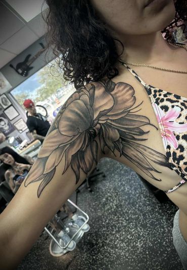 womens floral arm tattoo done by DJ Guinan at loyal 2 the coil tattoos and piercings