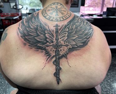 black and grey nordic backpiece tattoo done by DJ Guinan pro tattoo artist lee county florida