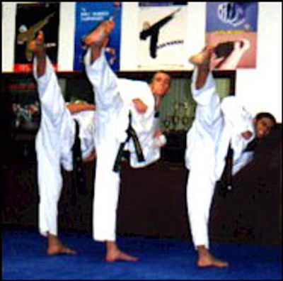 TaeKwonDo Black Belt Student Kicking Practice