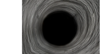 A deep, dark well with textured stone walls.