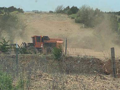 Construction equipment at Traverse Right of way clearing site