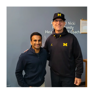 Chin Weerappuli with Coach Jim Harbaugh
