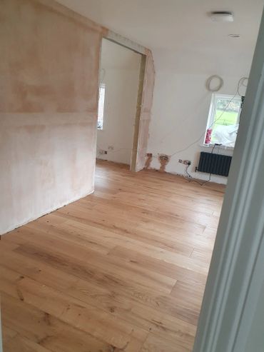 New floor laid and new wall & sliding door installed