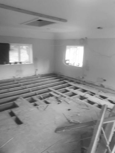 Office renovation, starting to level the floor joists.