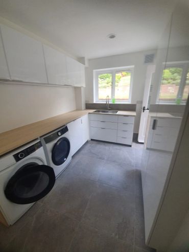 Utility room installation, Ikea cabinets and plumbing complete.