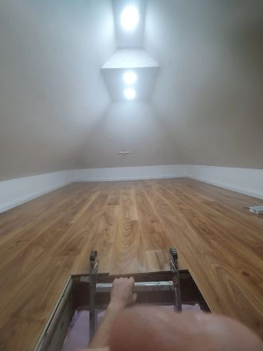 Loft complete with plastering, new lights and floor installed.