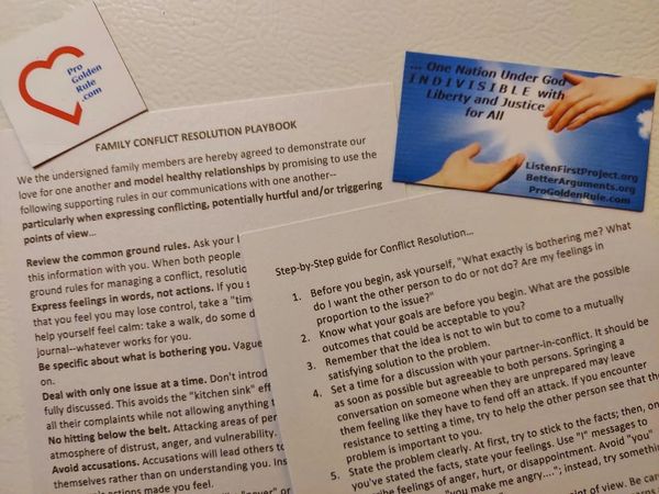 Documents and cards about family conflict resolution and healthy communication.