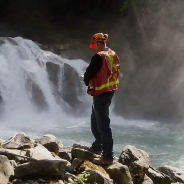 Andrew Booth monitoring water quality on the Jimmy Creek Hydroelectric Project