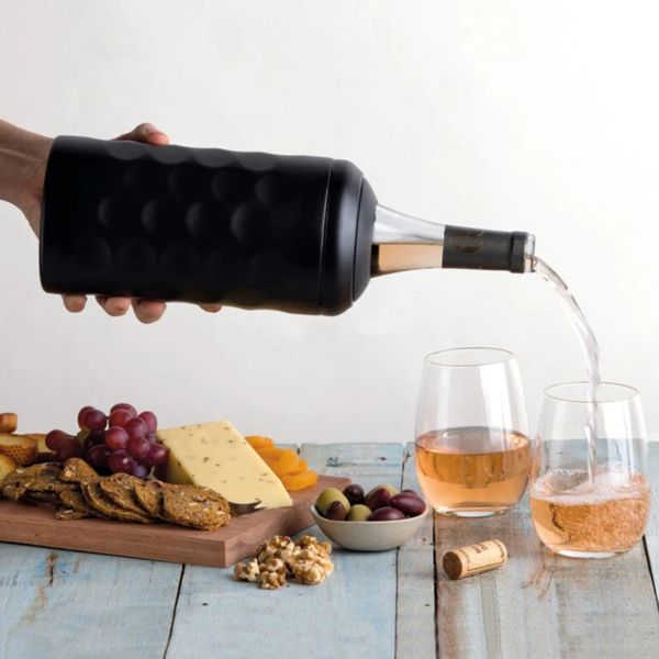 Pour your wine from the wine cooler. No need to take it out of the wine cooler to pour.