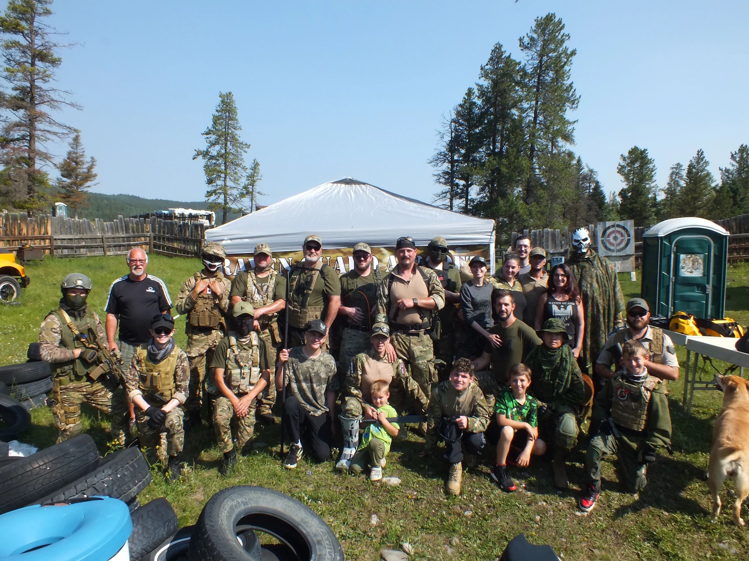 Airsoft team members standing together smiling for a photo