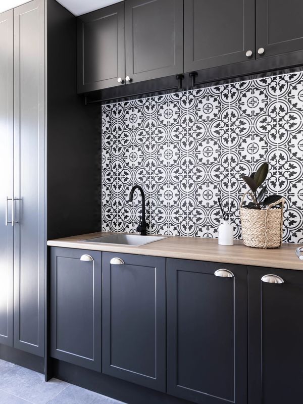 Bright and stylish laundry after transformation by Simpson Interiors