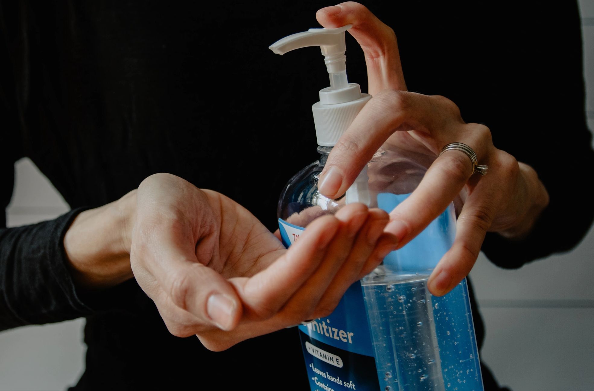 Person using hand sanitiser - Photo by Kelly Sikkema on Unsplash