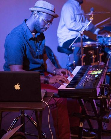 Playing Keyboard with "Soulosophy" show band at Chasers Night Club in Macon Ga.